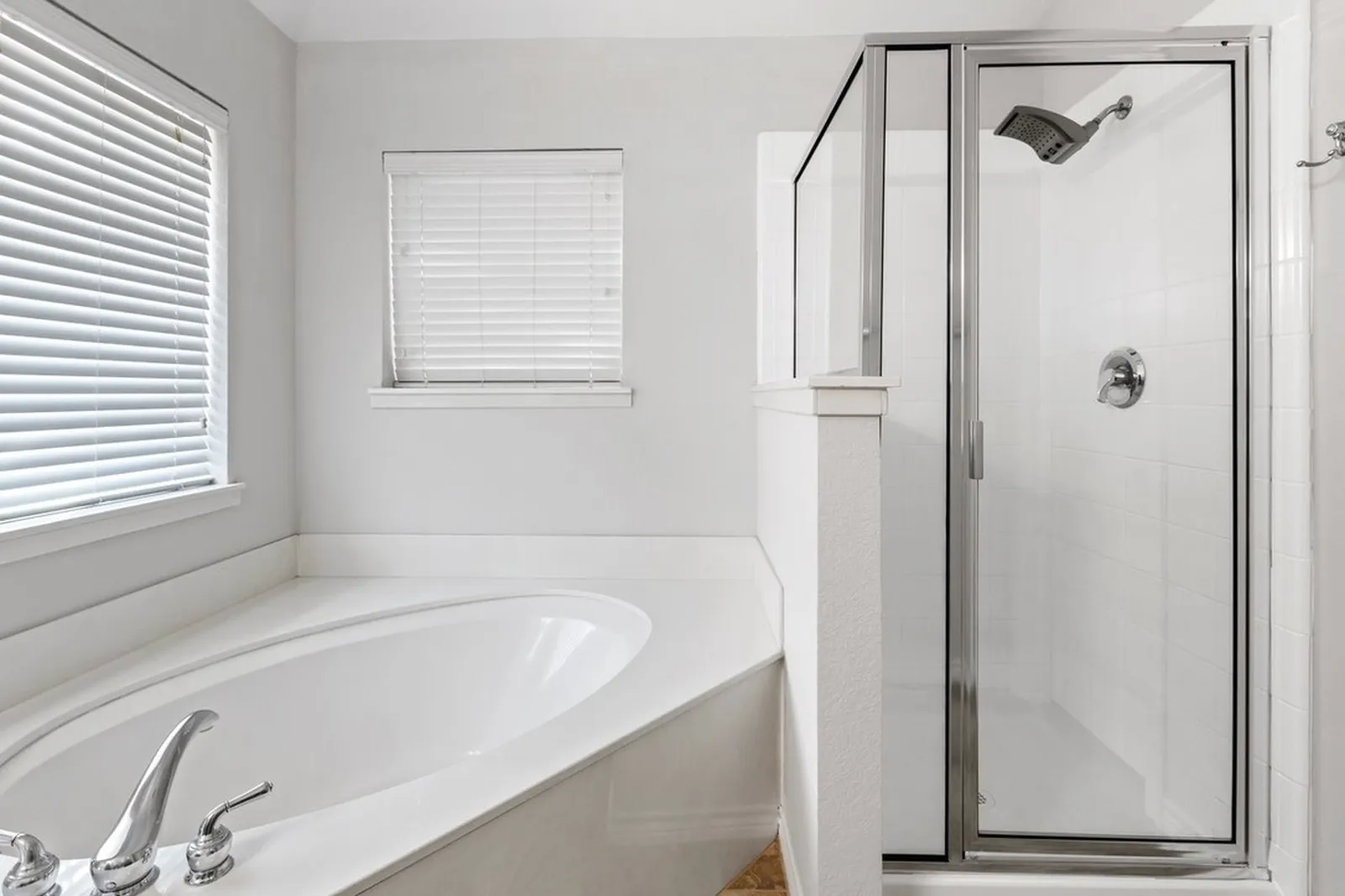 Primary bath at Biscayne in Frisco after new counters, fixtures, and paint