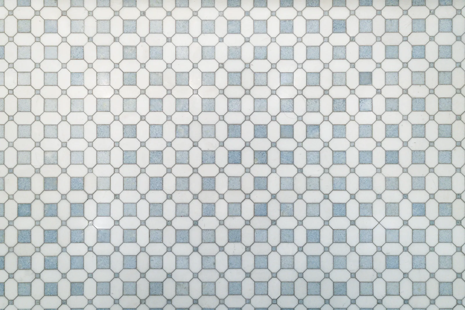 Blue and white marble mosaic bathroom floor at Revere Pl. in Lakewood