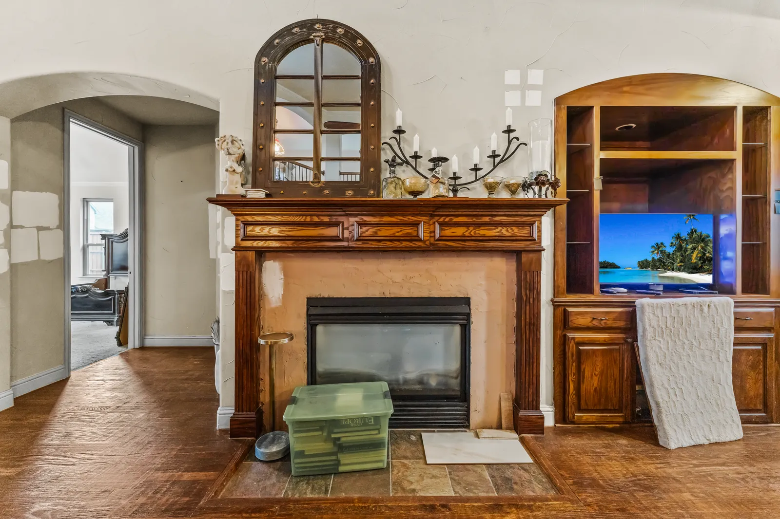 Shady Point Dr living room before the remodel: the original fireplace and built-ins